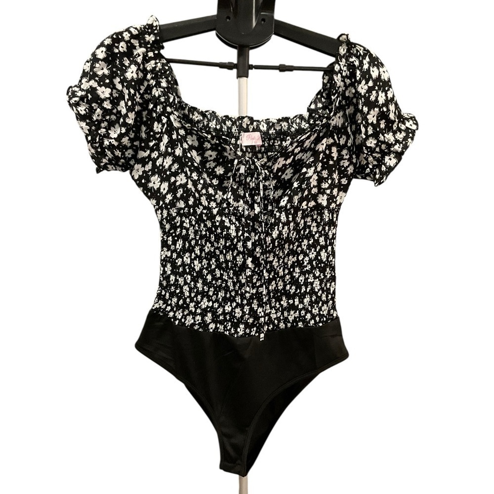 Pink Lily Black and White Floral Smocked Bodysuit